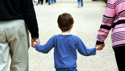 Child holding hands