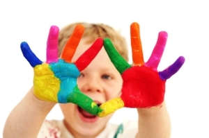 child with painted hands