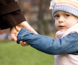 Grandchild holding hand