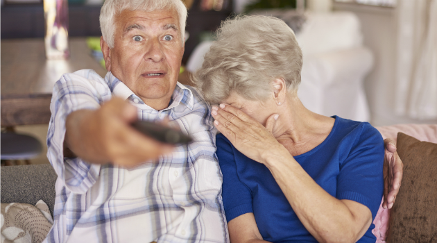couple watching scary film